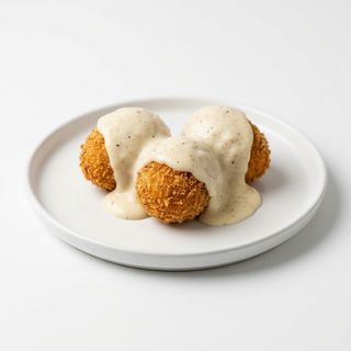 Huevos bechamel (1/4 kg.)