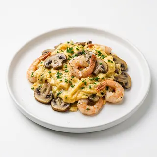 Revuelto De Champiñones Y Gambas (Ración)