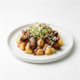 Yuca Con Tiras De Costilla