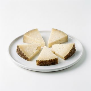 Ración De Tabla De Queso Curado De Oveja