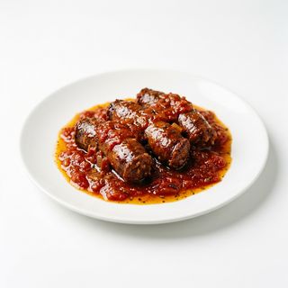 Ración De Salchichas Con Tomate