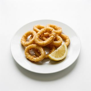 23. Anillos A La Romana (Ración)