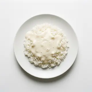 Arroz Con Salsa Blanca