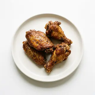 Alitas De Pollo Fritas (4 Uds.)