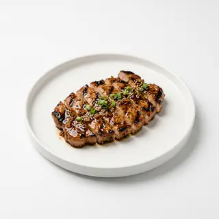 Carne De Cerdo A La Plancha