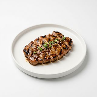 Carne De Cerdo A La Plancha