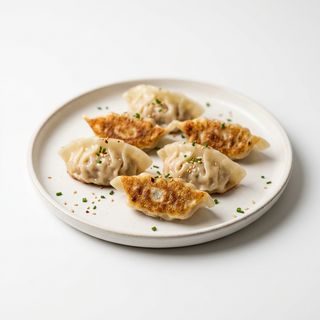 Gyozas de Pollo o Cerdo (6 ud.)