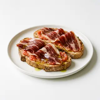 Jamón Ibérico Con Pan Tumaca