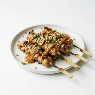 202- Pincho De Pollo Satay (1 Ud.)
