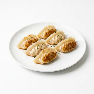 E8. Gyozas De Pollo, Cerdo O Gambas (6 Uds.)