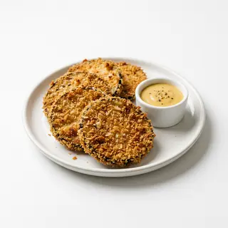 Berenjena crujiente con salsa de miel y mostaza