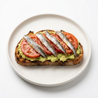 Tosta De Aguacate Con Tomate Y Anchoas (Tapa)