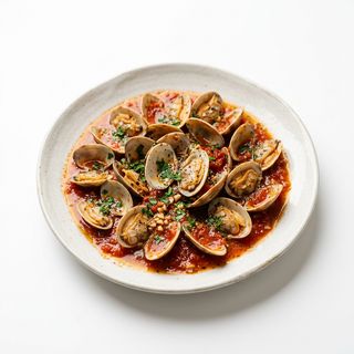 Almejas blancas tomate y ajillo