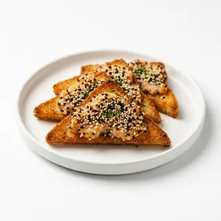 Tostadas de langostinos y sésamo