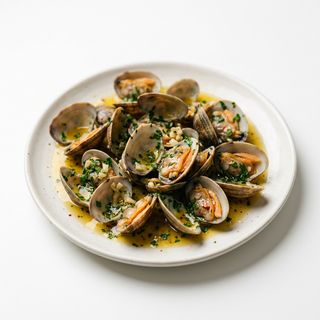 Tapa De Almejas Al Ajillo