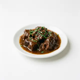 Tapa De Carne En Salsa