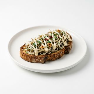 Tapa De Tosta De Gulas Con Alioli
