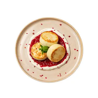 Сирники з сметаною та малиновим джемом (243г)