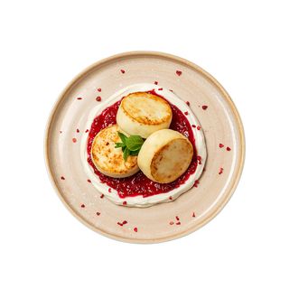 Сирники з сметаною та малиновим джемом (243г)