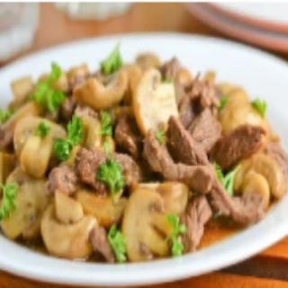 55-Ternera Con Champiñones