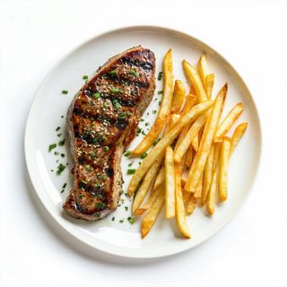 Bistecca di pollo con patatine fritte