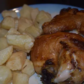 MEDIO POLLO Y FRITAS