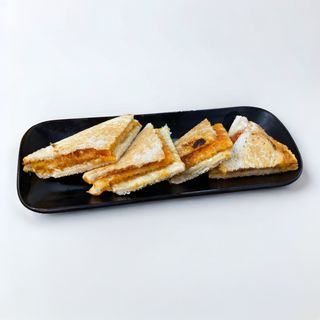 Triquini de sobrassada con emmental al toque de miel