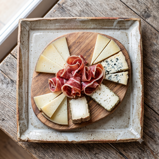 Tabla De Jamón Ibérico Y Quesos