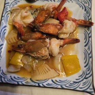 64 Gamberoni con verdure in salsa piccante