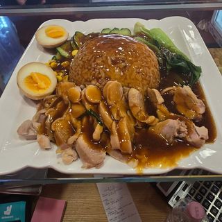 Riso con coscia di pollo