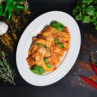 Ravioli con ricotta e ragu