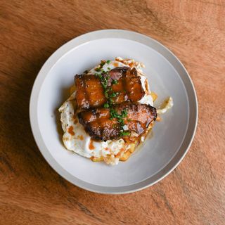 Ous estrellats amb cansalada