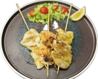 Spiedini di calamari e gamberi