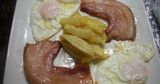 Plato De Panceta Fresca A La Plancha Con Huevo Frito y Patatas Fritas 