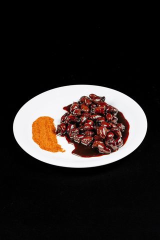 Сердечка курячі в соусі (100г)