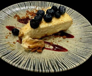 Pastel De Queso Casero (Porción)
