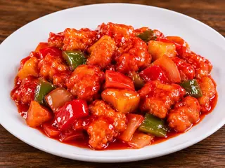 Курица в кисло-сладком соусе (250г)