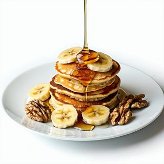 Pancake con miele, banana e noci
