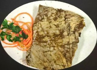 Branzino in foglia di banana al vapore