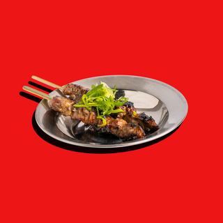 Spiedino di polpo alla brace curry thai e riso