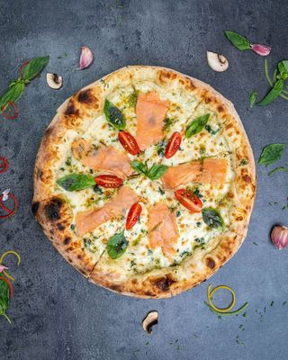 3 Pizzas premium achetées = 1L Soda OFFERT au choix