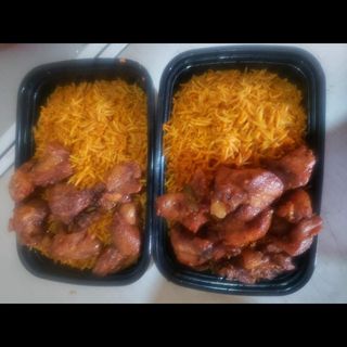 Jollof + Fried rice + 2 pieces Beef