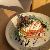 Toast with cottage cheese, salmon and poached egg