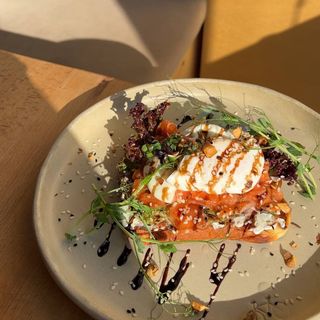 Toast with cottage cheese, salmon and poached egg