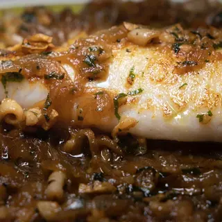 Calamar Encebollado