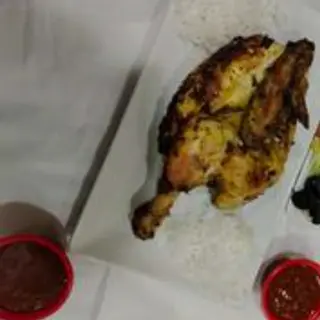1/2 Pollo A Last Con Arroz