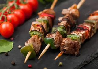 Carne de Porco Sag com Espinafres