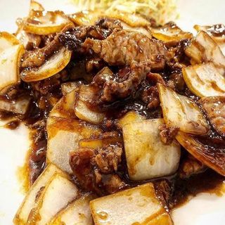 Ternera con cebolla en salsa de ostra