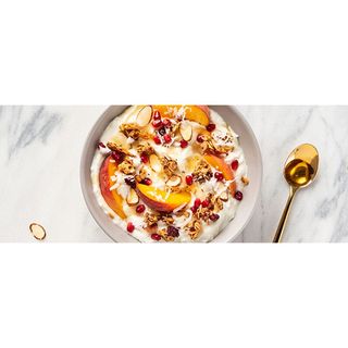 Fruit salad with yoghurt, nuts & honey