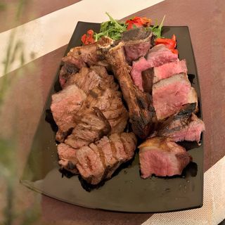 Tagliata con rucola e grana